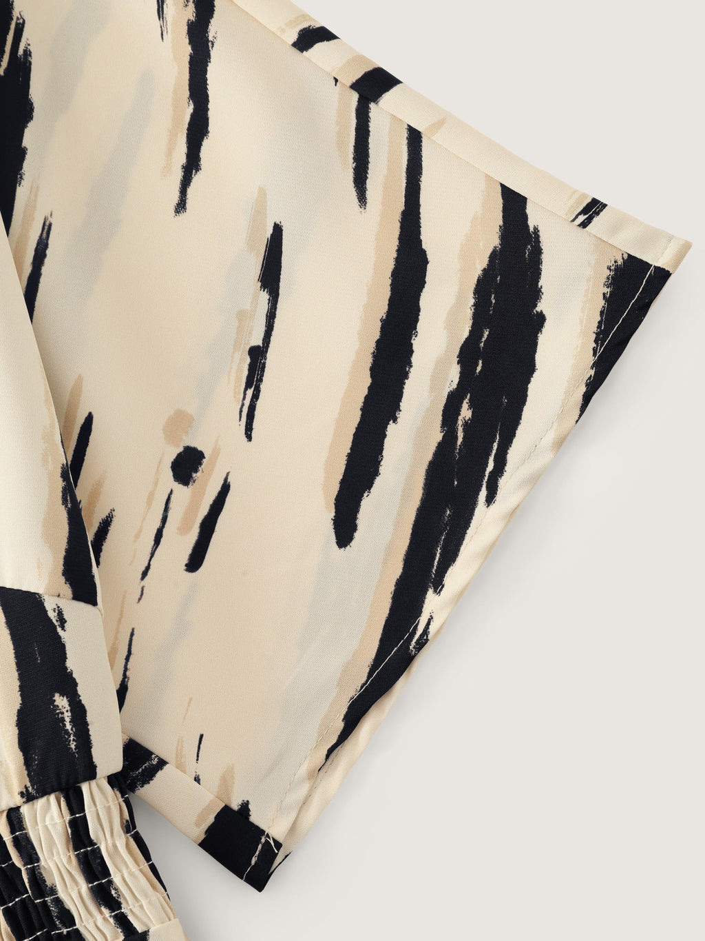 Abstract Print V Neck Shirred Waist Peplum Blouse